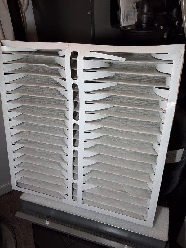 Responded to service call for Lennox system displaying "Urgent service message" on thermostat. Diagnostic inspection revealed Indoor Fan Motor Failure alerts recorded on January 8, 2024, and December 31, 2023, though system was currently operating normally. Inspected and replaced air filter which showed signs of extended use, cleared error codes from thermostat, and verified proper system operation before concluding service.