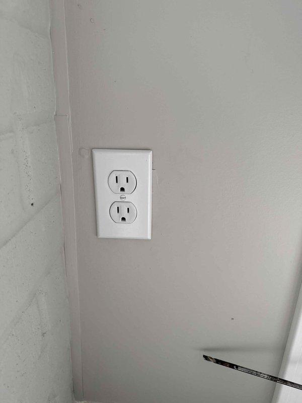 Successfully installed a 9000 BTU mini-split system in client's sunroom with 110V electrical connection. Unit was wall-mounted on white brick surface above windows, providing efficient cooling for the space. Verified proper electrical receptacle installation and system functionality before completing the job.