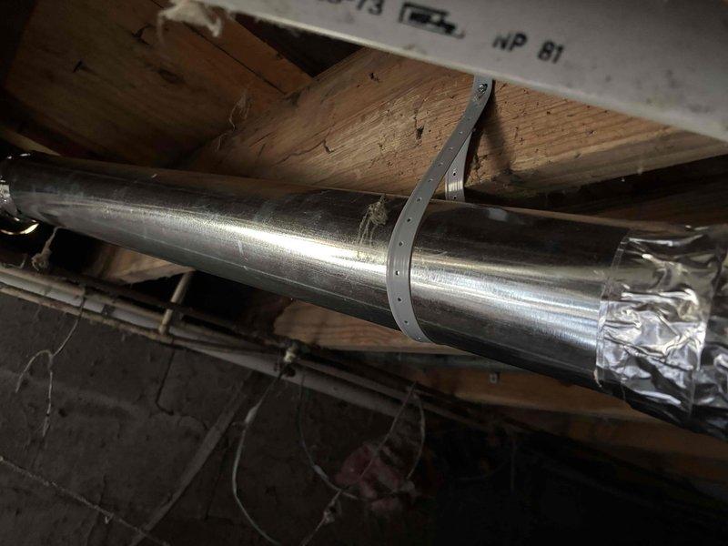 Installed new flexible ductwork in sizes 6", 7", and 8", along with 10' of 4"-26 gauge metal pipe and two 4"-26 gauge elbows. Secured metal ductwork to joists with proper supports and sealed connections with metallic foil tape. Additionally installed white dryer vent cap on exterior wall to complete the ventilation system.