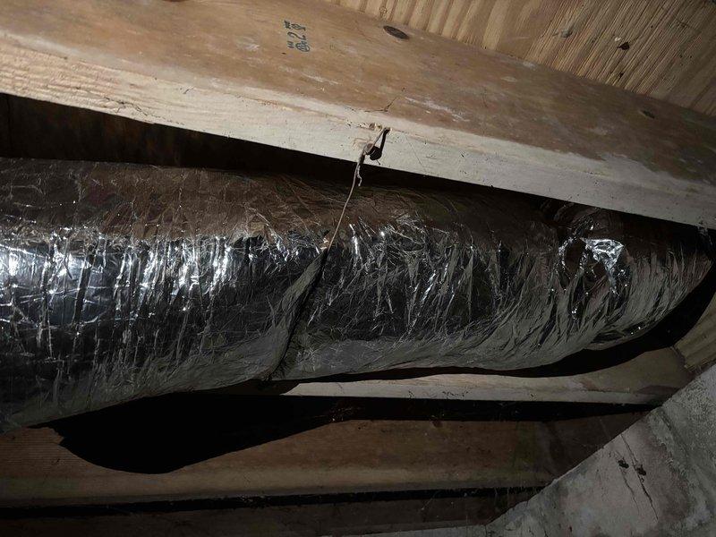 Installed new flexible ductwork in sizes 6", 7", and 8", along with 10' of 4"-26 gauge metal pipe and two 4"-26 gauge elbows. Secured metal ductwork to joists with proper supports and sealed connections with metallic foil tape. Additionally installed white dryer vent cap on exterior wall to complete the ventilation system.