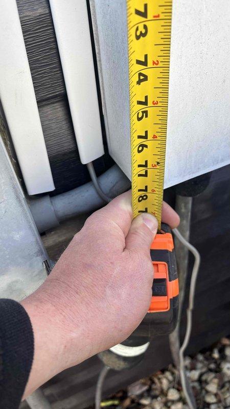 Conducted comprehensive HVAC replacement estimate for aging but functional system, taking precise measurements of the existing outdoor unit and examining its placement relative to the home's exterior features. Documented the current installation configuration with photographs to ensure accurate sizing recommendations for the replacement system.