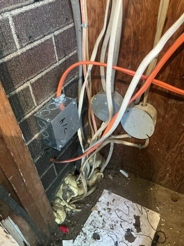 Diagnosed downstairs HVAC unit with non-functioning heat due to damaged ignition control board and exposed wiring with evidence of rodent damage. Installed and programmed new ignition control board, repaired chewed wiring with proper splicing techniques, and replaced air filters in both upstairs and downstairs units to restore system functionality.