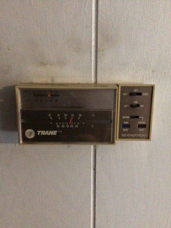 Performed comprehensive assessment of existing HVAC system, including inspection of aging Trane Weathertron analog thermostat and outdoor unit showing significant weathering with visible rust formation. Provided customer with replacement options for complete system upgrade, recommending high-efficiency equipment to replace the deteriorated outdoor condensing unit and modernize outdated control interface.