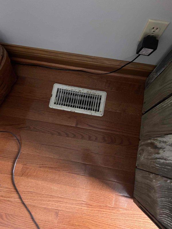 Completed Platinum Level maintenance service on one HVAC system. Inspected and documented condition of floor registers showing significant rust/dirt accumulation and aging. Noted electrical connections and vent positioning for proper airflow distribution throughout the space.