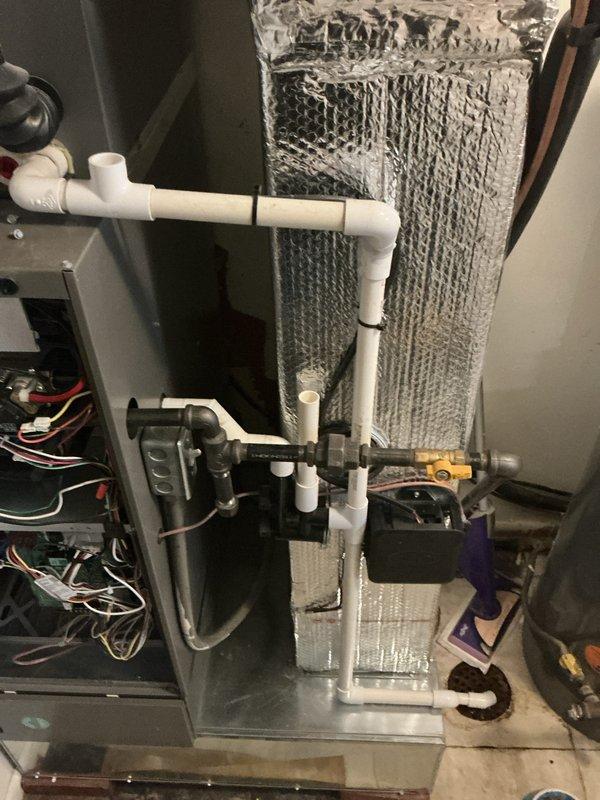 Performed scheduled single maintenance on relatively new HVAC system (6 months old). Inspected outdoor condenser unit, electrical connections, and condensate drain system with PVC piping. Replaced air filters and verified proper system operation during this first annual maintenance visit.