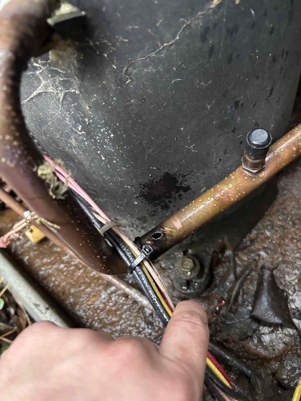 Performed Platinum Level maintenance on an 8-year-old HVAC system. Inspected and replaced 20x20x5 filter during first annual visit. Examined electrical connections and refrigerant lines, noting debris accumulation under unit structure requiring cleanup for proper airflow and system efficiency.