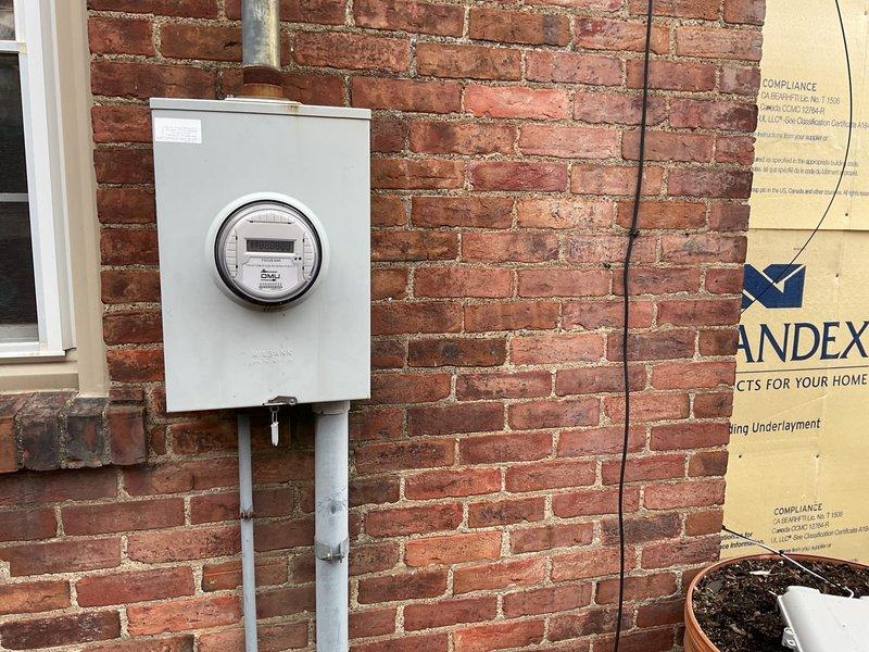 Conducted a comprehensive site assessment for a generator installation at a residence with a 200 amp breaker panel and natural gas availability. Documented existing electrical infrastructure, including meter location and surrounding clearances. Evaluated optimal placement options considering proximity to gas supply, electrical panel, and code-required setbacks from openings and combustibles.