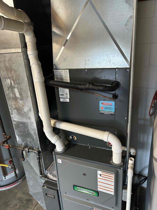 Conducted comprehensive assessment of existing basement HVAC system, including State ProLine XE water heater and primary furnace unit with PVC intake/exhaust configuration. Prepared detailed ductwork modification estimate to address airflow inefficiencies observed in the current installation, with recommendations for improved insulation on existing black flex ducts to enhance system performance and energy efficiency.