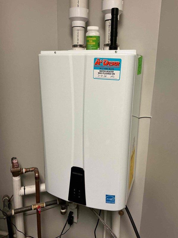 Performed a complete maintenance flush on an A.O. Smith tankless water heater to remove mineral buildup and ensure optimal performance. The system was thoroughly cleaned using manufacturer-recommended procedures, and all connections were inspected for proper function. Documentation was applied to the unit indicating the service date, and the water heater was confirmed to be operating efficiently after maintenance was completed.