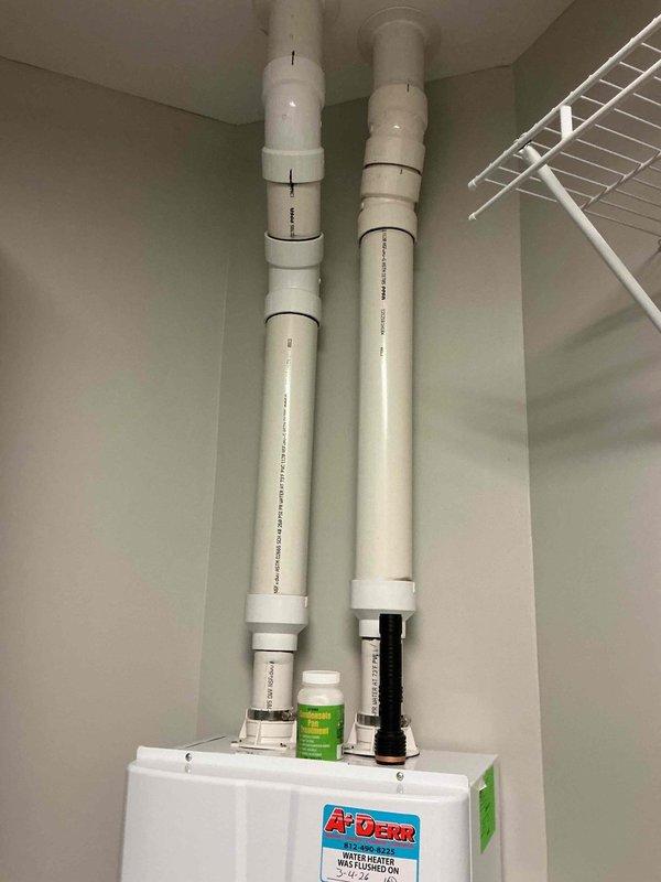 Performed a complete maintenance flush on an A.O. Smith tankless water heater to remove mineral buildup and ensure optimal performance. The system was thoroughly cleaned using manufacturer-recommended procedures, and all connections were inspected for proper function. Documentation was applied to the unit indicating the service date, and the water heater was confirmed to be operating efficiently after maintenance was completed.