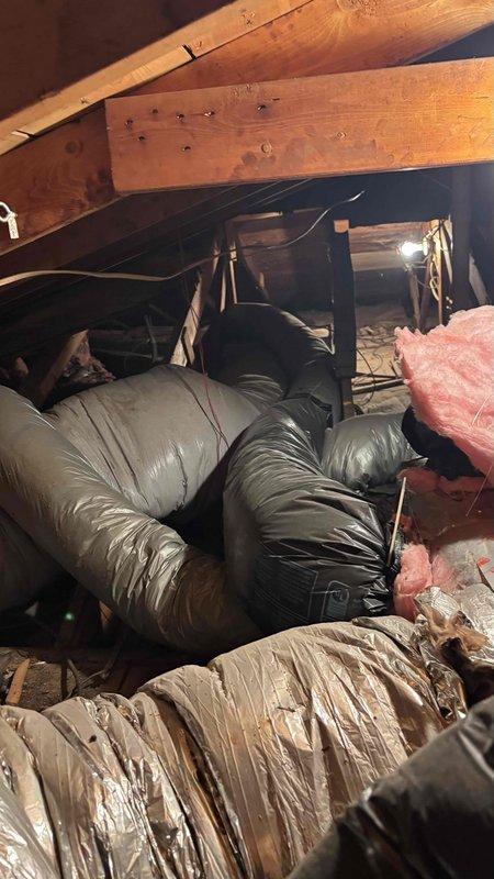 Conducted a comprehensive HVAC replacement estimate for an inoperative system. Inspection revealed an aging outdoor unit with significant debris accumulation around the base and examined the attic ductwork system which showed multiple flexible ducts requiring evaluation. Customer was unavailable until 3:30pm, limiting immediate consultation on replacement options.