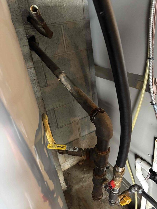 Completed scheduled Platinum Level maintenance on HVAC system, replacing 25x25x5 filter as part of regular service plan. Inspected copper piping system showing oxidation and aging, particularly on main riser with elbow joint. System functioning properly despite visible pipe wear; documented condition with photos for future reference.