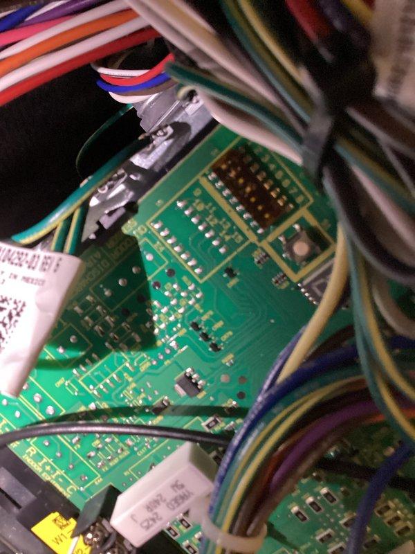 Performed scheduled 6-month maintenance visit on HVAC system. Inspected and photographed circuit board components, verifying proper wire connections to terminals (red, blue, yellow, white, and black). Examined blower motor assembly and electronic control board for any visible issues; all components appear to be functioning normally with no signs of damage or wear.