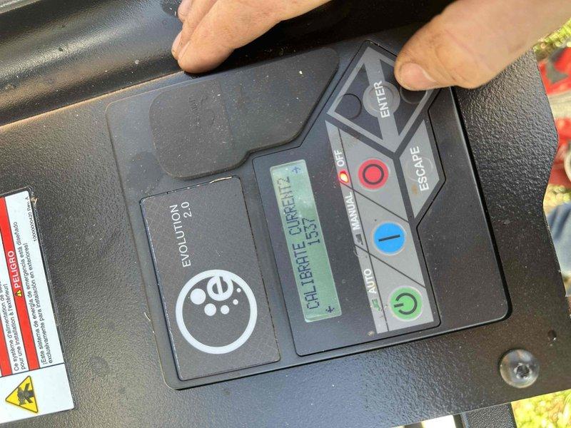 Performed preventative maintenance on generator system with Evolution 2.0 controller. Calibrated control panel offset parameter to 133 and verified proper voltage readings of 120.7V DC using clamp meter. Unit functioning correctly but will require renewal in June 2025; customer has been advised to schedule accordingly.