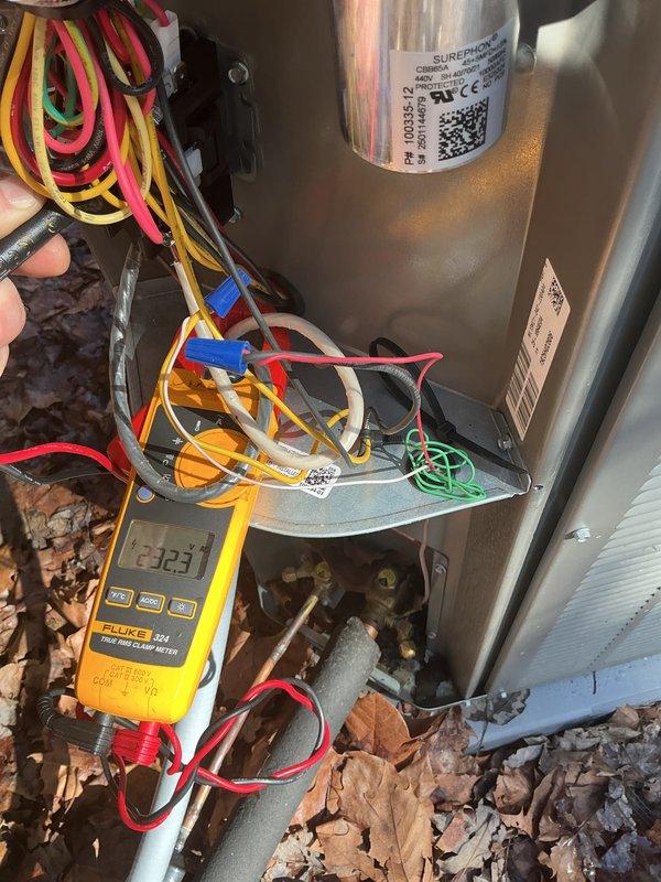 Completed annual planned maintenance on HVAC system installed 9/15/25. Performed electrical diagnostic testing with multimeter, recording voltage readings of 23.1V across system components. Inspected and verified proper operation of SUPERPRO capacitor and associated wiring connections in outdoor unit.