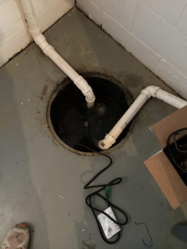 Diagnosed and replaced failed sump pump in basement utility area, ensuring proper installation of new unit with connections to existing PVC discharge piping. Tested system operation to confirm adequate water removal and proper cycling, restoring basement flood protection.