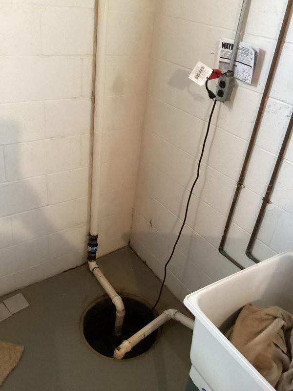 Diagnosed and replaced failed sump pump in basement utility area, ensuring proper installation of new unit with connections to existing PVC discharge piping. Tested system operation to confirm adequate water removal and proper cycling, restoring basement flood protection.