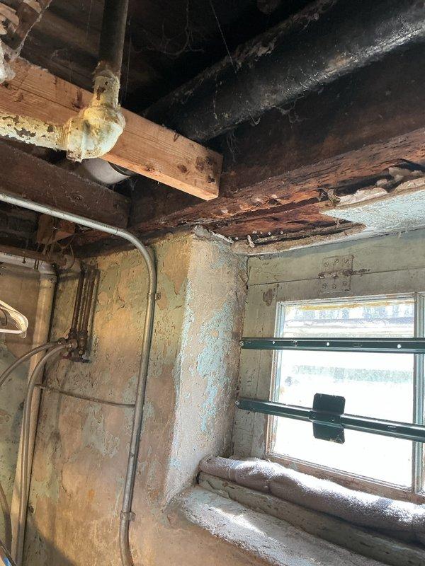 Replaced a perforated pipe segment in a 200-year-old home where water damage was evident in ceiling joists and wall surfaces. Accessed the deteriorated section through an existing cavity, installing new PVC piping to replace the damaged metal pipe. Verified system integrity after completion with no leaks observed.