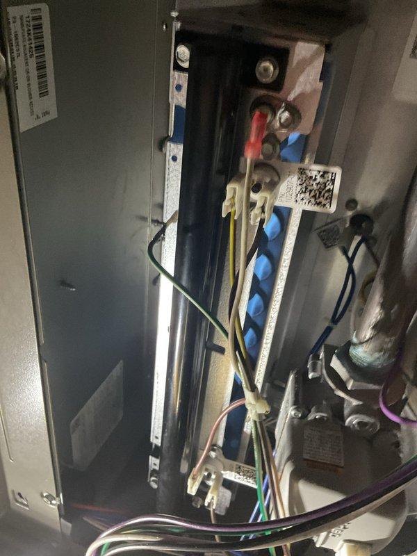 Responded to callback regarding thermostat error indicating system ran for 5 hours with temperature drop. Inspected wiring connections at control panel and examined internal components of the HVAC unit. Verified proper terminal connections and inspected circuit board functionality to resolve the temperature regulation issue.