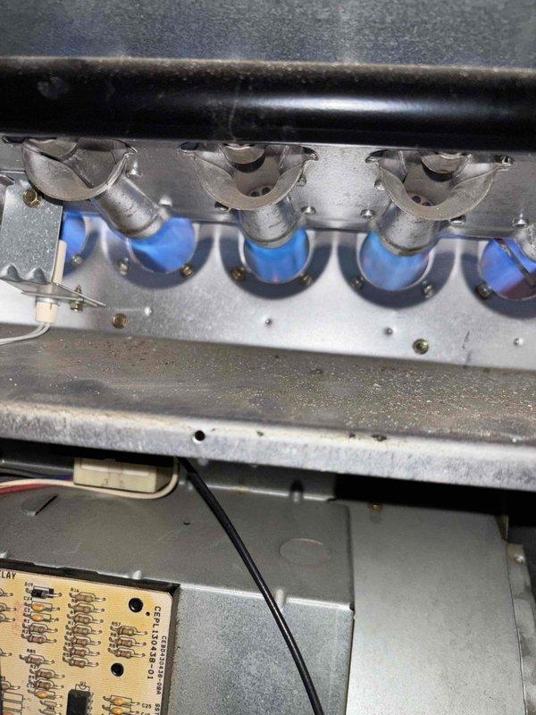 Completed scheduled Gold Level annual maintenance service on one HVAC system (second visit of the year). Replaced ACE air filter with customer-provided replacement and inspected burner assembly, confirming proper flame pattern and combustion. System control board was examined and all components are functioning normally; system is operating within manufacturer specifications.