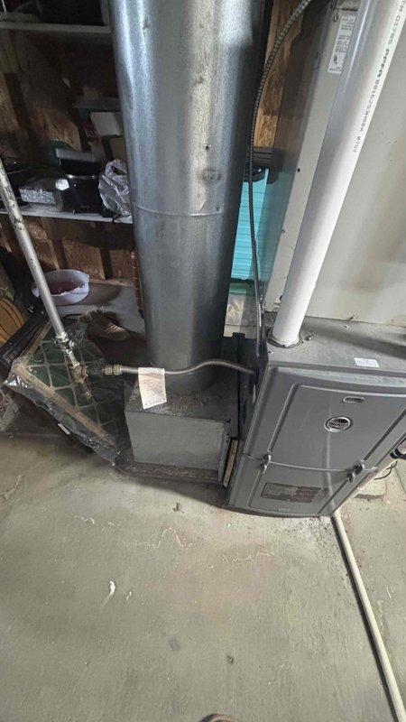 Conducted a comprehensive HVAC replacement estimate for a system experiencing refrigerant leakage issues. Visual inspection revealed an aging furnace installation with standard galvanized ductwork and PVC venting in the utility area. System requires replacement rather than repair as requested by homeowner, who was present during the consultation.