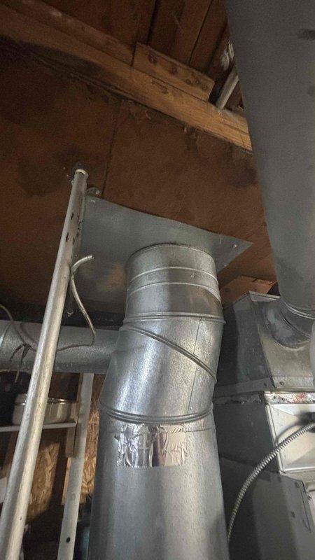 Conducted a comprehensive HVAC replacement estimate for a system experiencing refrigerant leakage issues. Visual inspection revealed an aging furnace installation with standard galvanized ductwork and PVC venting in the utility area. System requires replacement rather than repair as requested by homeowner, who was present during the consultation.