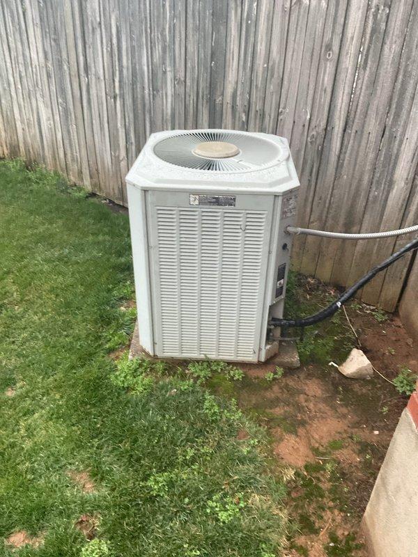 Diagnosed no-heat condition on 15+ year old HVAC system. Performed comprehensive inspection of aging equipment, including thermostat functionality check and outdoor unit assessment. Recommended replacement due to system age and wear patterns observed on condenser components.