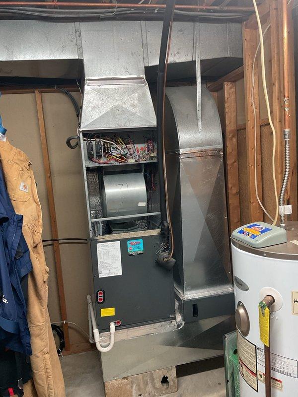 Completed second visit of Gold Level maintenance on 5-year-old HVAC system. Inspected outdoor unit's electrical compartment, checking capacitors and wiring connections for proper function. Examined indoor furnace components and ductwork in utility room, verifying system operation. Replaced 16x20x5 filter and discussed annual renewal options with customer.