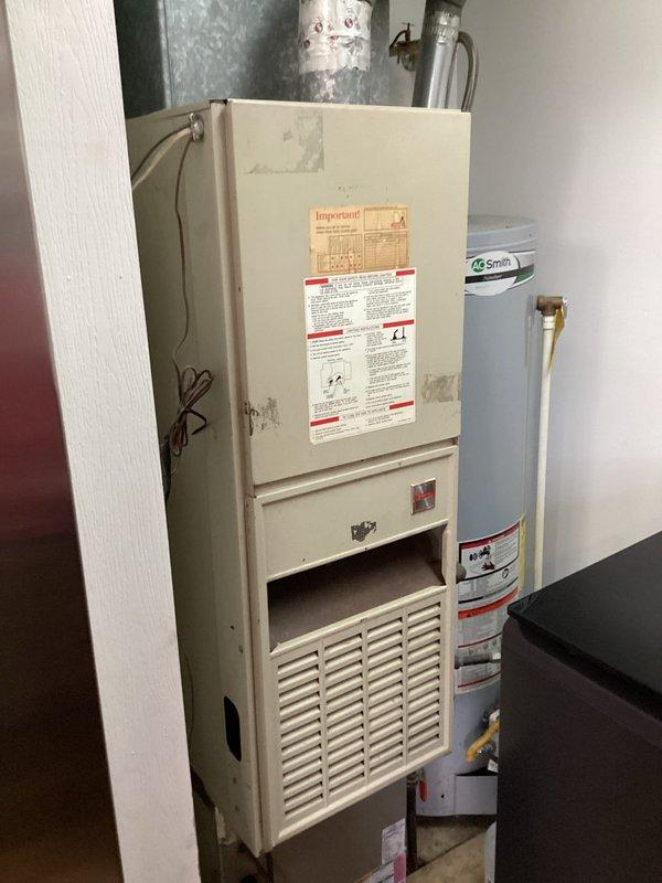 Diagnosed and repaired non-functioning outdoor condensing unit, discovered failed capacitor and defective contactor preventing proper cooling operation on aging system. Replaced components, tested system operation, and verified proper cooling performance with customer's Nest thermostat now showing appropriate temperature differential.