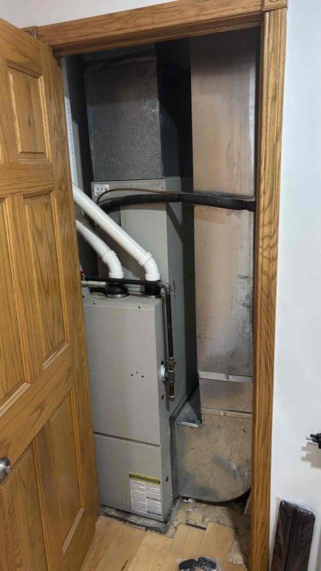 Conducted comprehensive HVAC system replacement estimate for a property with non-functioning upstairs unit. Inspected existing equipment including indoor air handler in utility closet and exterior gas meter installation. Documented system configuration and installation space constraints for accurate replacement specifications.