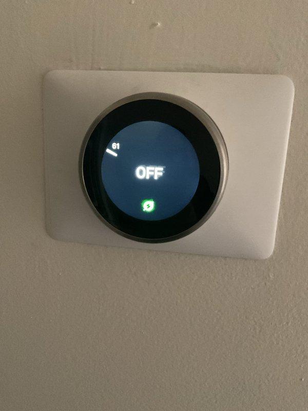 Responded to a callback for system non-operation following previous maintenance visit. Inspected thermostat showing "OFF" status with ambient temperature reading of 61°. Used diagnostic probe to test control board connections and verified proper wiring configuration. System restored to normal operation after resolving control signal issue.