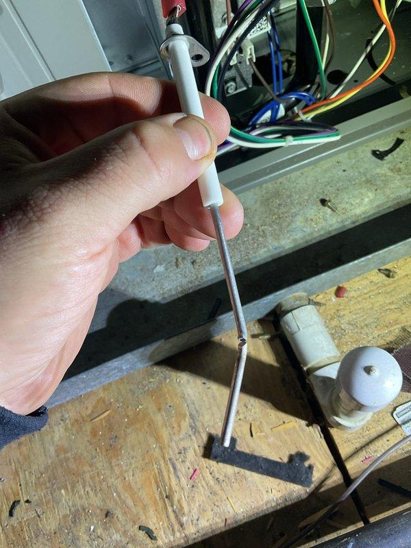 Responded to a callback for system non-operation following previous maintenance visit. Inspected thermostat showing "OFF" status with ambient temperature reading of 61°. Used diagnostic probe to test control board connections and verified proper wiring configuration. System restored to normal operation after resolving control signal issue.