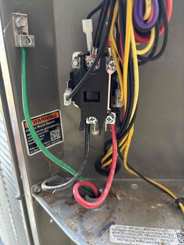 Conducted planned maintenance visit on HVAC system. Performed electrical inspection of control panel, checking all wire connections and components for proper installation. Verified system voltage readings using Fluke multimeter, confirming 4.97V at test points, which is within acceptable parameters. All connections were secure and no electrical issues were identified.