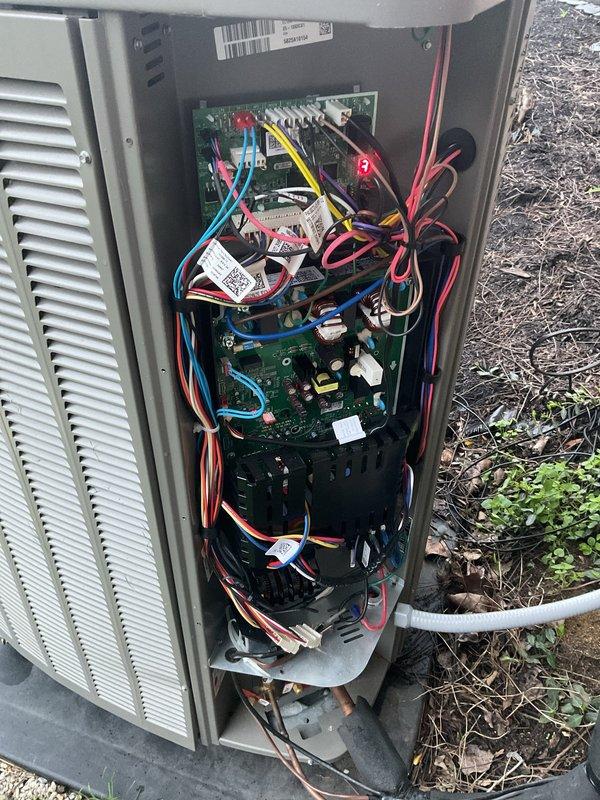 Diagnosed and repaired communication issue on nearly new heat pump system that was preventing heating and cooling operation. Inspection of circuit board revealed loose wire connections at the main control board, which were properly secured and tested. System now communicating properly with all components and functioning at optimal performance.