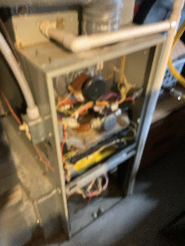Performed diagnostic on 13+ year old heating system that was blowing cold air. Inspection revealed issues with the aging furnace components and connected outdoor heat pump unit. Restored proper heating operation by cleaning critical components, replacing worn parts, and recalibrating the system to ensure optimal performance.