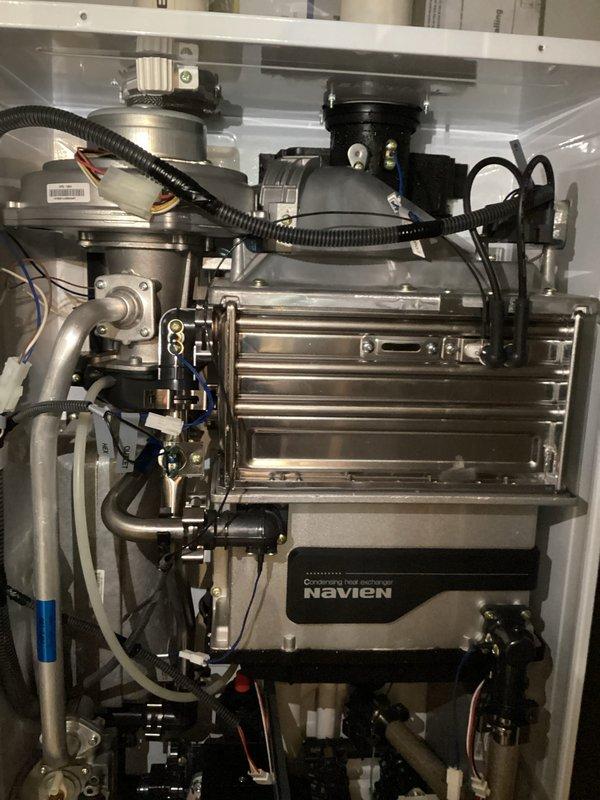 Successfully completed a scheduled maintenance flush on a Navien tankless water heater system to remove mineral buildup and sediment. Performed a thorough flush of the heat exchanger using appropriate descaling solution, ensuring proper flow through all components and collecting discharge in containment vessel. System was properly reassembled, tested for operation, and returned to service in optimal working condition.