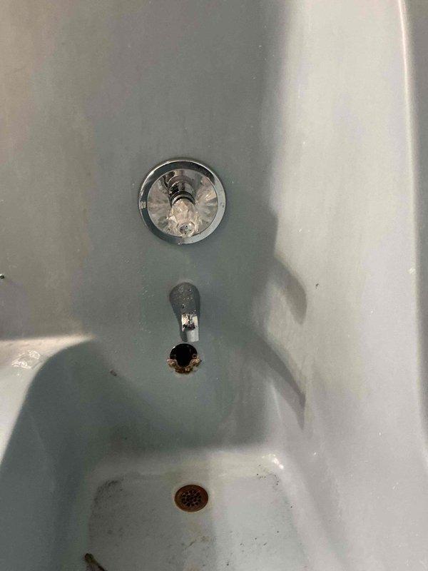 Responded to service call for a broken ball valve after customer attempted to replace mixer assembly. Upon inspection, found damaged brass mixing valve with copper supply lines in bathroom fixture wall. Successfully replaced the damaged valve assembly and verified proper water flow with no leaks in the completed installation.
