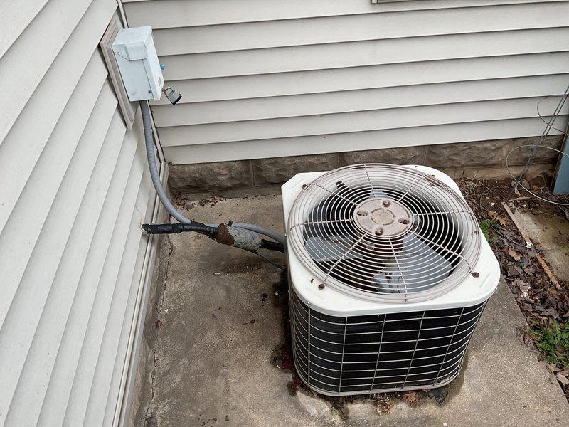 Conducted a comprehensive replacement evaluation for a 15-year-old residential HVAC system (both AC and furnace units). System currently operational but approaching end of useful service life. Visual inspection of the basement mechanical area and outdoor condenser unit completed with photo documentation to support replacement recommendation.