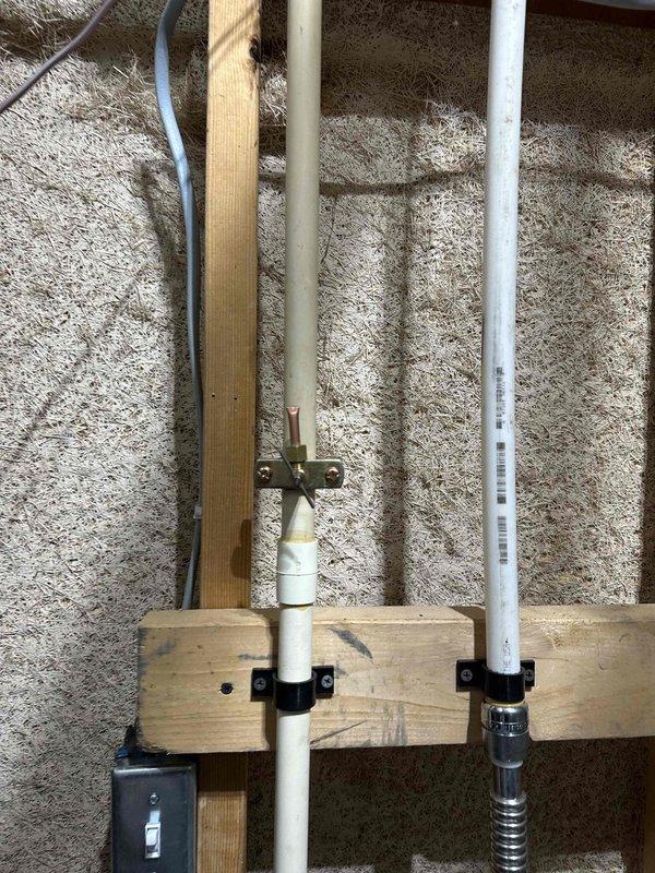 Conducted follow-up inspection of humidifier as requested from previous incomplete service visit. Examined HVAC ductwork system including metal junctions, seams and connections in ceiling/attic space. Inspected associated plumbing components including PVC pipes and insulation material mounted to wall framing studs with appropriate brackets and clips.