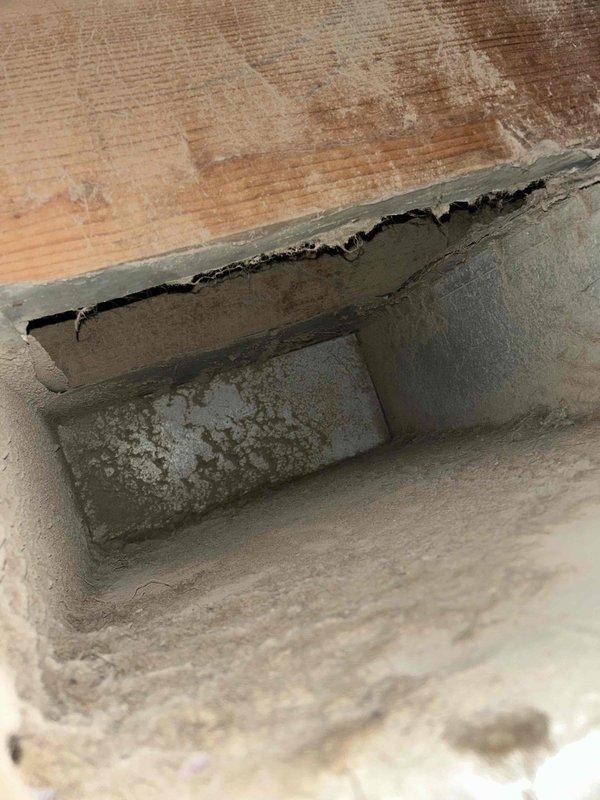Completed monthly maintenance service on Platinum Level HVAC system, including replacement of 16x25x5 filter (now in its 4th year). Observed and documented interior duct deterioration at wood-concrete junction showing possible moisture damage. Thermostat was operational, displaying 64°F during inspection.