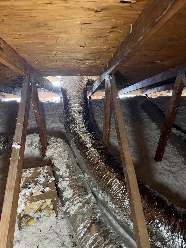 Successfully installed two new supply runs with properly insulated ductwork in attic space. Positioned and secured HVAC ducting between ceiling joists using appropriate metal brackets, ensuring optimal airflow throughout the structure. Visual inspection confirmed correct installation with all components properly sealed and insulated.