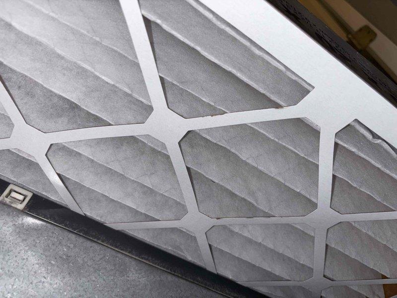 Performed monthly maintenance on 2-year-old Gold Level single system. Inspected and replaced dirty pleated air filter (20x25x5) and examined outdoor Lennox condenser unit. Noted customer requires longer hose for proper system cleaning; current hose insufficient for maintenance requirements. Recommended backpack sprayer as alternative solution.