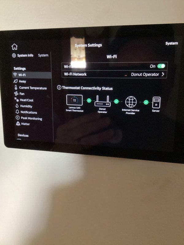 Performed annual Platinum Level maintenance on a Lennox system with a Smart S40 thermostat. Inspected control board (PN:107069-01, FW:1.81.5064) and verified all connections were secure. Confirmed Wi-Fi connectivity was functioning properly with successful connection between thermostat, network, and server.