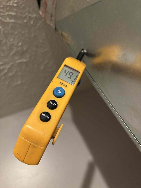 Performed scheduled monthly maintenance on Gold Level single system. Conducted diagnostic testing on system components with temperature readings recorded at 49°. Inspected circuit board and electrical connections, noting some dust accumulation but all wiring (yellow, pink, red, white, green) remained secure and functional. System is currently operational but unable to upgrade due to configuration limitations.
