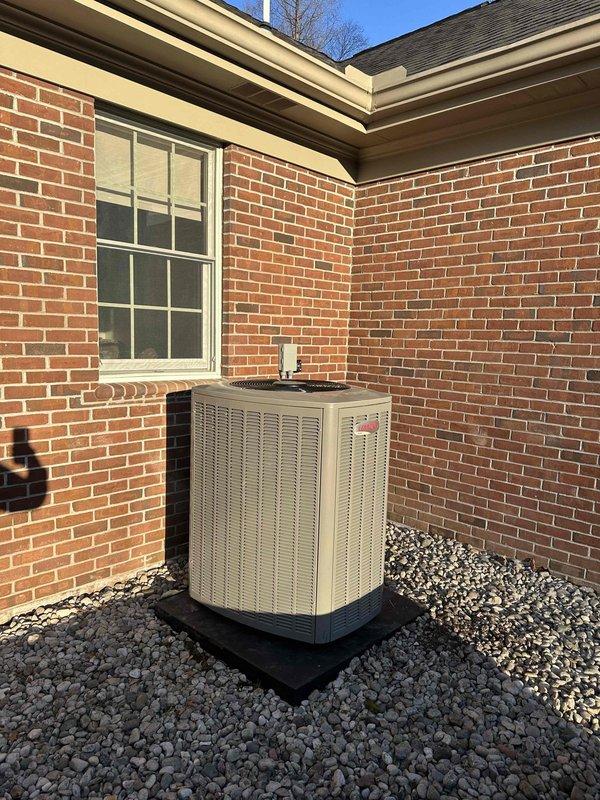 Completed installation of a GREEN 4-ton 18 SEER 99% efficient HVAC system with 3-zone capability. Work included mounting a new Lennox furnace in the utility closet with proper exhaust venting and ductwork connections, plus installation of the outdoor condenser unit on a protective pad with gravel surround. System was fully tested and is operating at optimal efficiency.
