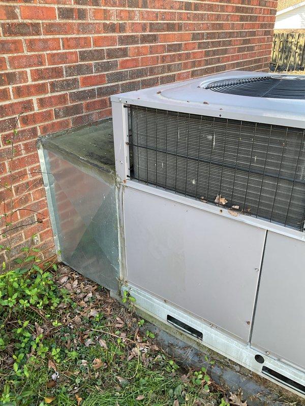 Conducted comprehensive assessment of existing outdoor HVAC unit showing significant weathering and age-related deterioration. Documented current installation conditions including copper line connections, electrical components, and concrete pad foundation for replacement quote. Recommended full system replacement with energy-efficient model to address performance concerns and improve home comfort.