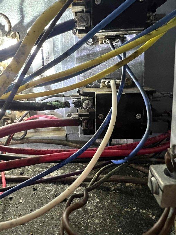 Responded to a no-cooling call for a 5-year-old HVAC system with customer complaint of thermostat power loss and no airflow from vents. Upon inspection, discovered loose and deteriorated electrical connections at the control panel. Repaired and secured all wiring connections, restoring proper power to the thermostat and system functionality.
