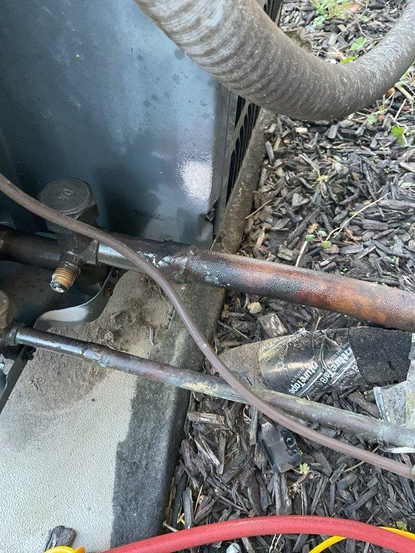 # Service Report

Responded to no-cool call on 15-year-old residential HVAC system with reported minimal airflow and outdoor unit failure to operate. Upon arrival, performed comprehensive system diagnostic including electrical testing, refrigerant pressure analysis, and airflow assessment. Identified failed compressor contactor preventing outdoor condenser unit from engaging. Replaced defective contactor and verified proper electrical connections throughout system. Inspected condenser coils showing moderate debris accumulation and weathering consistent with system age; cleaned coils to restore optimal heat transfer efficiency. Tested system operation through complete cooling cycle, confirming outdoor unit engagement, proper compressor function, and restored airflow at supply registers. System operating within manufacturer specifications at time of departure. Advised customer of system age and recommended monitoring for future component wear given visible corrosion on refrigerant lines 
