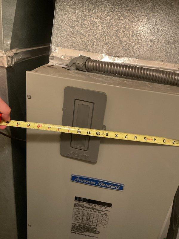 # HVAC Replacement Estimate Summary

Conducted comprehensive on-site evaluation for complete HVAC system replacement at residential property. Homeowner requested estimate for aging but functional system as proactive replacement measure. Assessed existing dual outdoor condenser units positioned on concrete pads along exterior brick wall and indoor American Standard air handling equipment. Documented current equipment specifications, measured existing unit dimensions, evaluated ductwork connections including flexible gray corrugated runs, and photographed installation configurations. Provided detailed replacement options and system sizing recommendations based on current equipment layout and home comfort requirements. Estimated appointment duration completed within standard 1 to 1.5 hour timeframe.