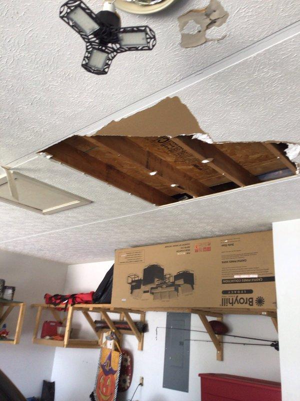 # Service Summary

Completed annual Platinum Level planned maintenance on a 9-year-old HVAC system. Replaced 16x25x5 filter and performed comprehensive system inspection per maintenance protocol.

# Work Performed

Conducted thorough annual maintenance service on single HVAC system as part of Platinum Level service agreement. Replaced system air filter with new 16x25x5 filter to ensure optimal airflow and system efficiency. Performed complete visual inspection of equipment and surrounding areas, documenting conditions with photographic records.

During inspection, identified significant ceiling damage in the immediate vicinity of the service area, with collapsed drop ceiling tiles exposing structural wooden joists and framework. Damage appears unrelated to HVAC system operation but was documented for customer awareness. Service area includes adjacent utility space housing Bradford White water heater installation with organized plumbing supply storage.

Completed all standard Platinum L